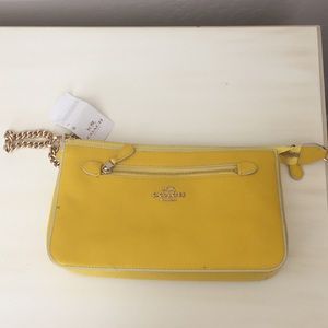 Coach wristlet with tags